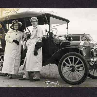 Photograph of Three Motorists and Ford Vehicle, Undated