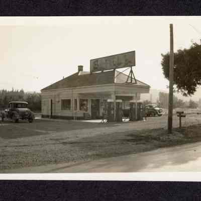 Photograph of Shell Gas Station next to Pawn Shop, undated