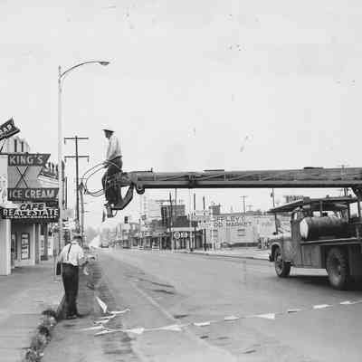 Photograph of setting up for Shoppers Paradise event on Main Street, Springfield, Oregon, 1957