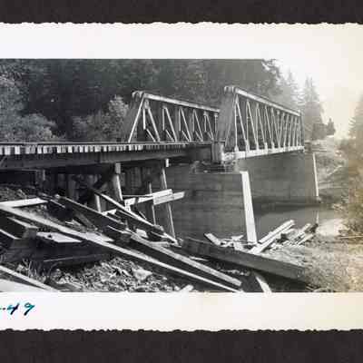 Photograph of OP&E rail bridge over unknown river, 1949