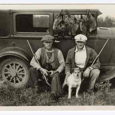 Photograph of Bill Davis senior, Smith Mountjoy and dogs, hunting trip, undated