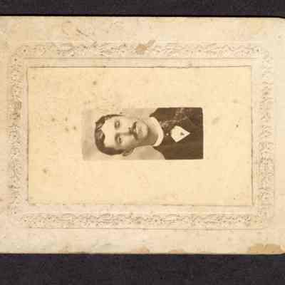 Photograph of a young man dressed in a suit, Undated