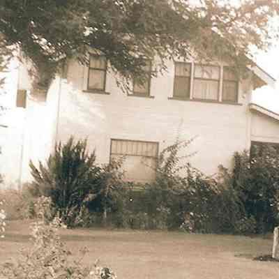 Photograph of Ernie Bergs Farmhouse and Yard, Undated