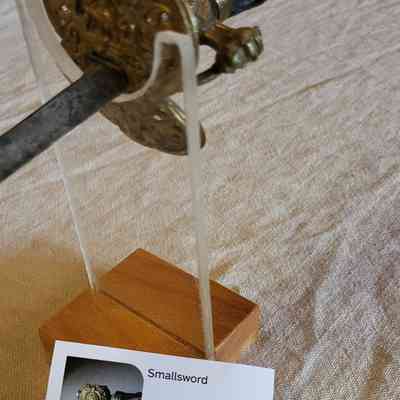 Close-up of hilt and former display card