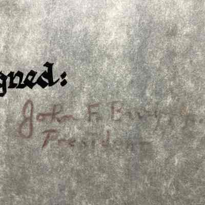 Signature of John F. Barry, President