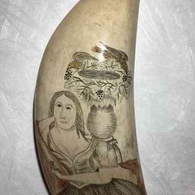 Side of item depicting woman
