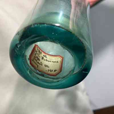 Bottom of bottle with label