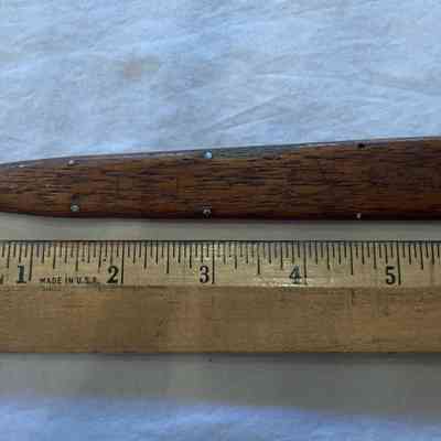 Wooden sheath: JMJS NRI inscription