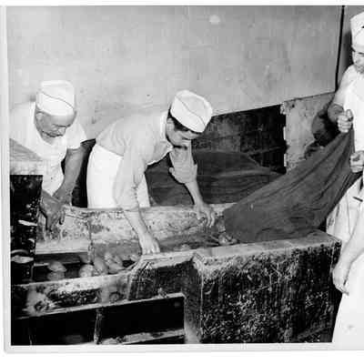 Blount Seafood Corp Warren R.I. clams on a conveyer belt 25x20 glossy black and white