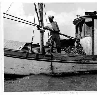 Blount Seafood Corp Warren R.I. man on boat 25059 25x20 glossy black and white