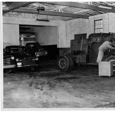 Blount Seafood Corp Warren R.I. mechanic working on truck 25x20 glossy black and white