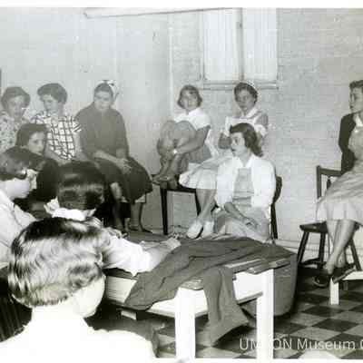 Meeting in the Nurses' Home Kitchen