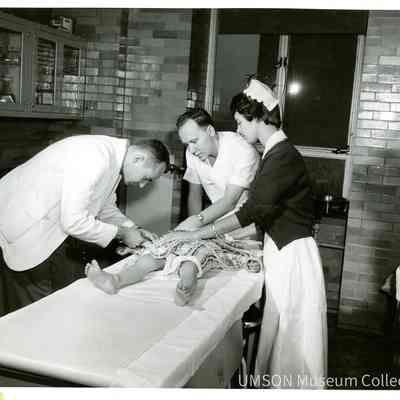 Patient being treated in Emergency Room at University Hospital