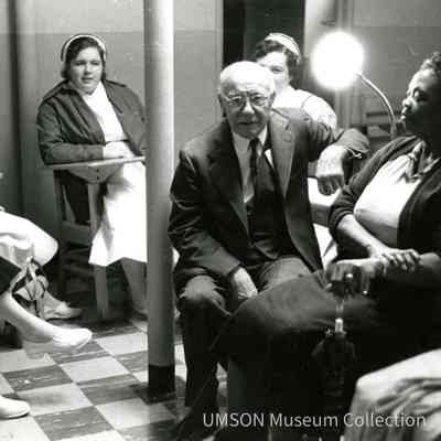 Patients and nurses in the University Hospital Outpatient Department waiting room, n.d.