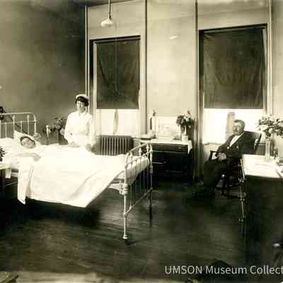 Nellie E. Dix, DIN 1916 attending to a private patient, University Hospital, Maryland, 1920