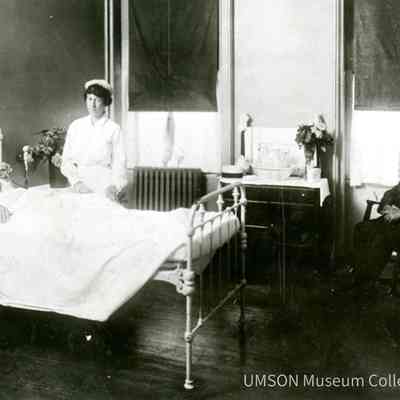 Nellie E. Dix, DIN 1916 attending to a private patient, University Hospital, Maryland, 1920