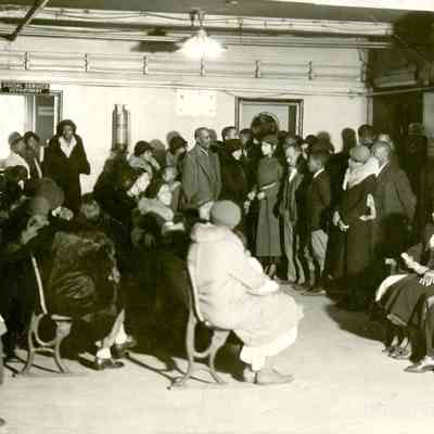 Black patients waiting in the basement of University Hospital segregated outpatient clinic, 1934