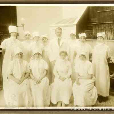 Operating Room nurses and physician, University Hospital, Maryland, 1920