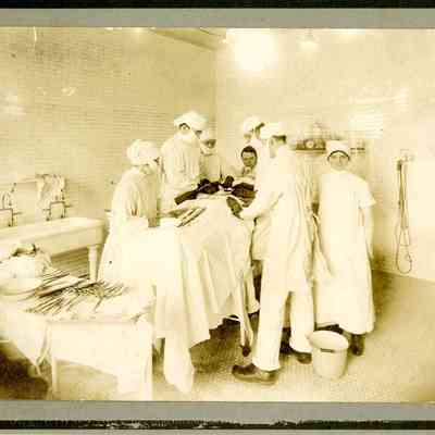Nurses assisting in the operating room, University Hospital, 1918