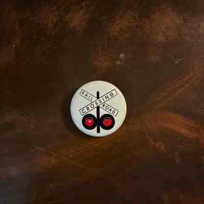 Button-Crossing Sign