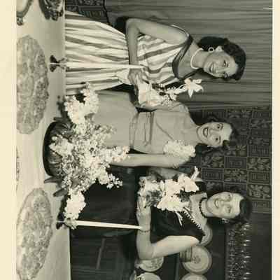 Three ladies at social function