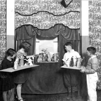 Students with miniature stage sets