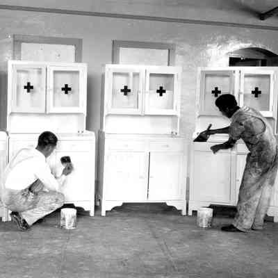 Medic supply cabinets being painted