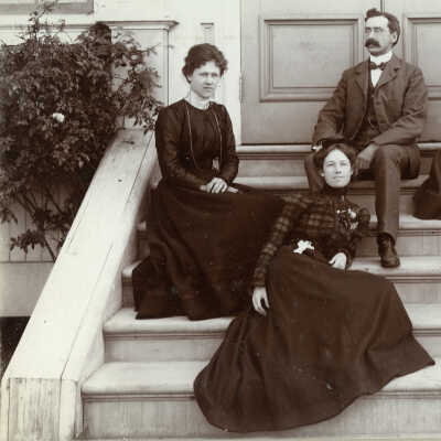Teachers sitting on the school stairs