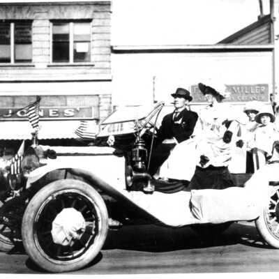 Car with family in parade, Shattuck Avenue