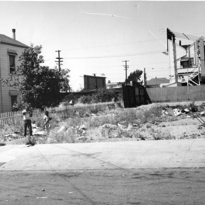 Empty lot with two children playing