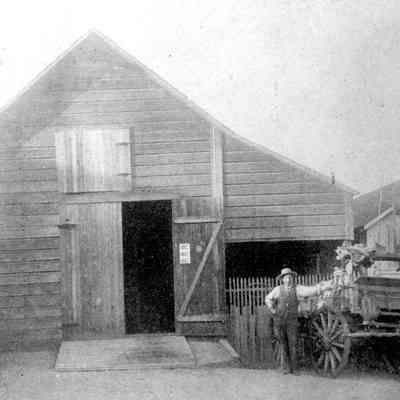 Ed Gordon in front of a barn