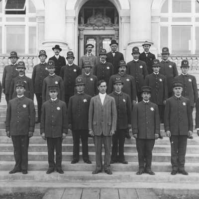 August Vollmer and police force.