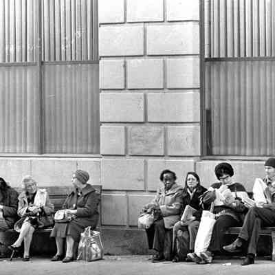 Shoppers at bus stop, Center at Shattuck