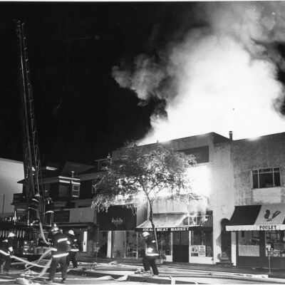 Fighting Walnut Street fire over buildings on Shattuck Avenue