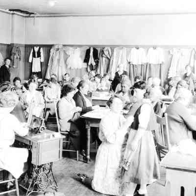 People making school costumes