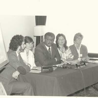 Photographer unknown. At table with Lee Halterman (left); otherunidentified people, Press Club of San Francisco, n.d.: 2011.060.336o