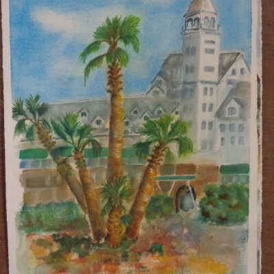 Claremont Hotel with large palm trees