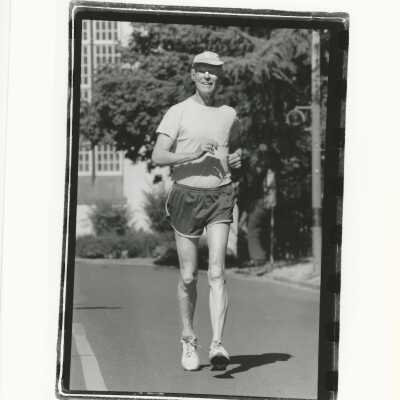 2011.060.075e: Tertius Chandler,, 80, competitive runner. Chester King Vega, photog. 1995.