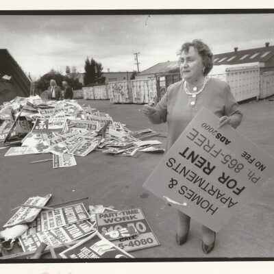 2011.060.112m: Noah Berger, photog. 1996. With reclaimed signs.