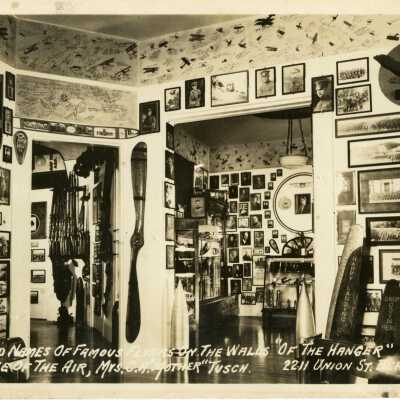 Photos and Names of Famous Flyers on the Wall "Of The Hanger"