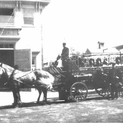 Fire Dept horse drawn ladder truck
