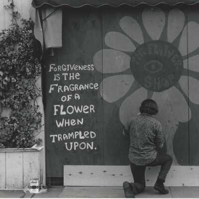 Mural painted by flower shop owner whose windows were accidentally broken by demonstrators