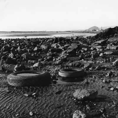 Tidelands, Tires, mud, rocks