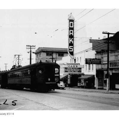 Big Red Train in front of Oaks Theater
