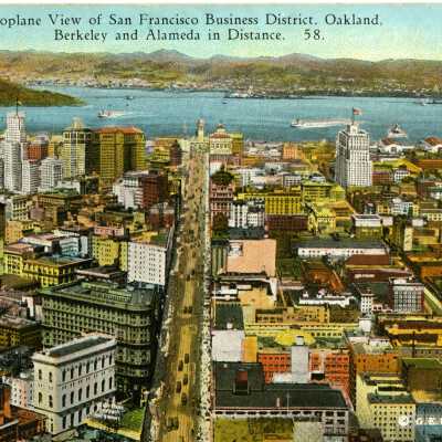 Aeroplane view of San Francisco business district. Oakland, Berkeley and Alameda in distance
