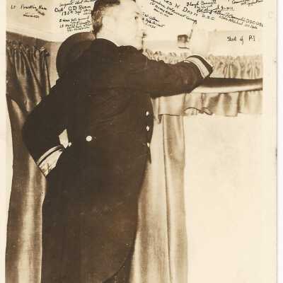 Admiral Byrd "Signing up" at the Shrine of the Air