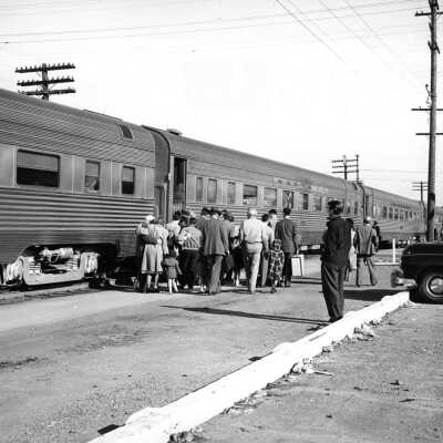 Passengers getting on a train