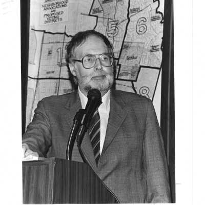 2011.060.214b: Don Melandry, photog. 4/3/1986. District election debate.
