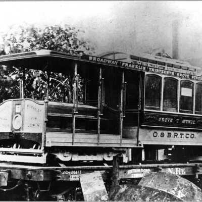 Streetcar, Grove Street car being delivered on train flatcar