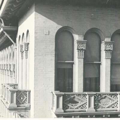 The Barker Block [three windows near top of building]